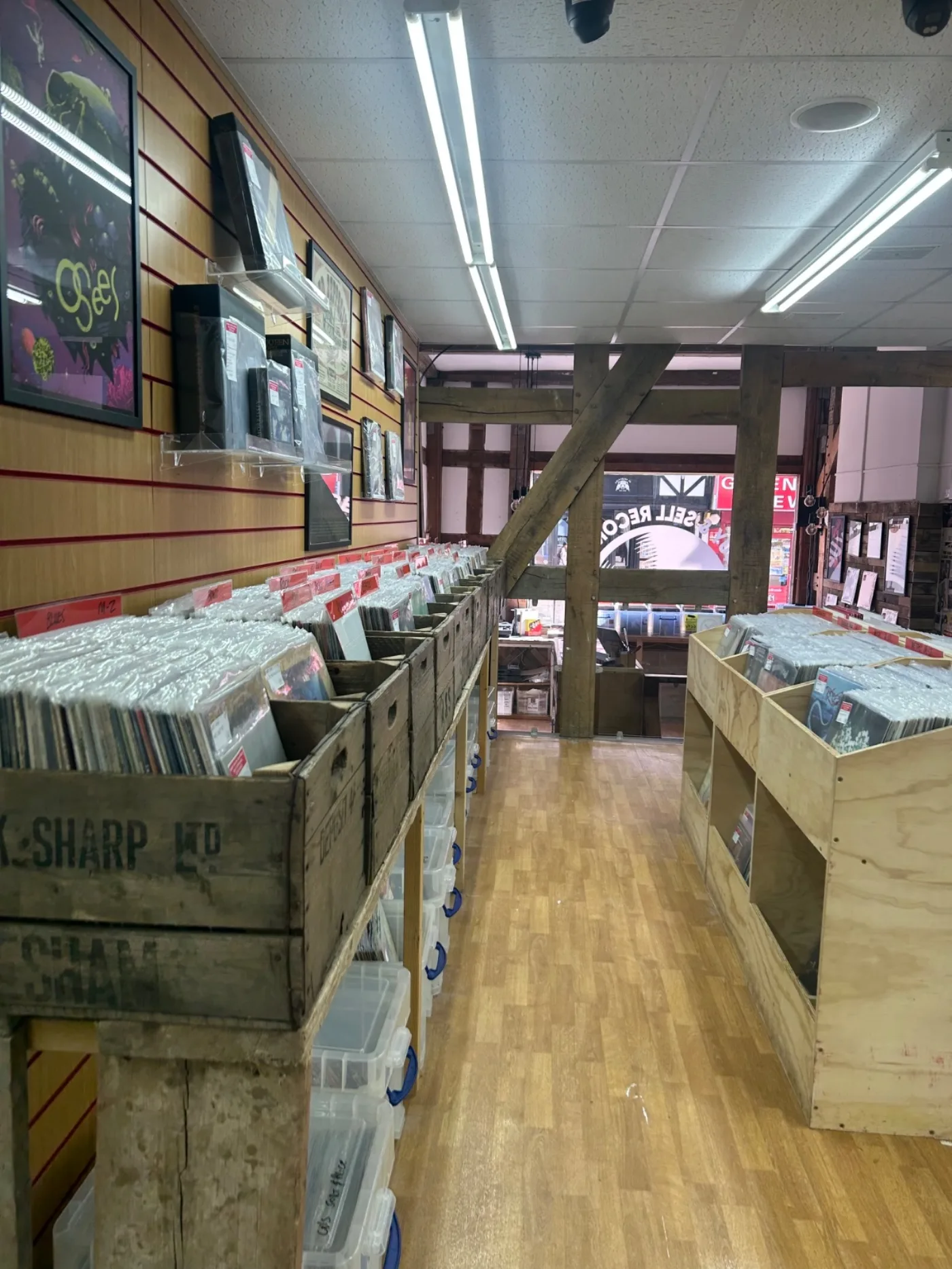 Vinyl crates lining the stairway into the shop