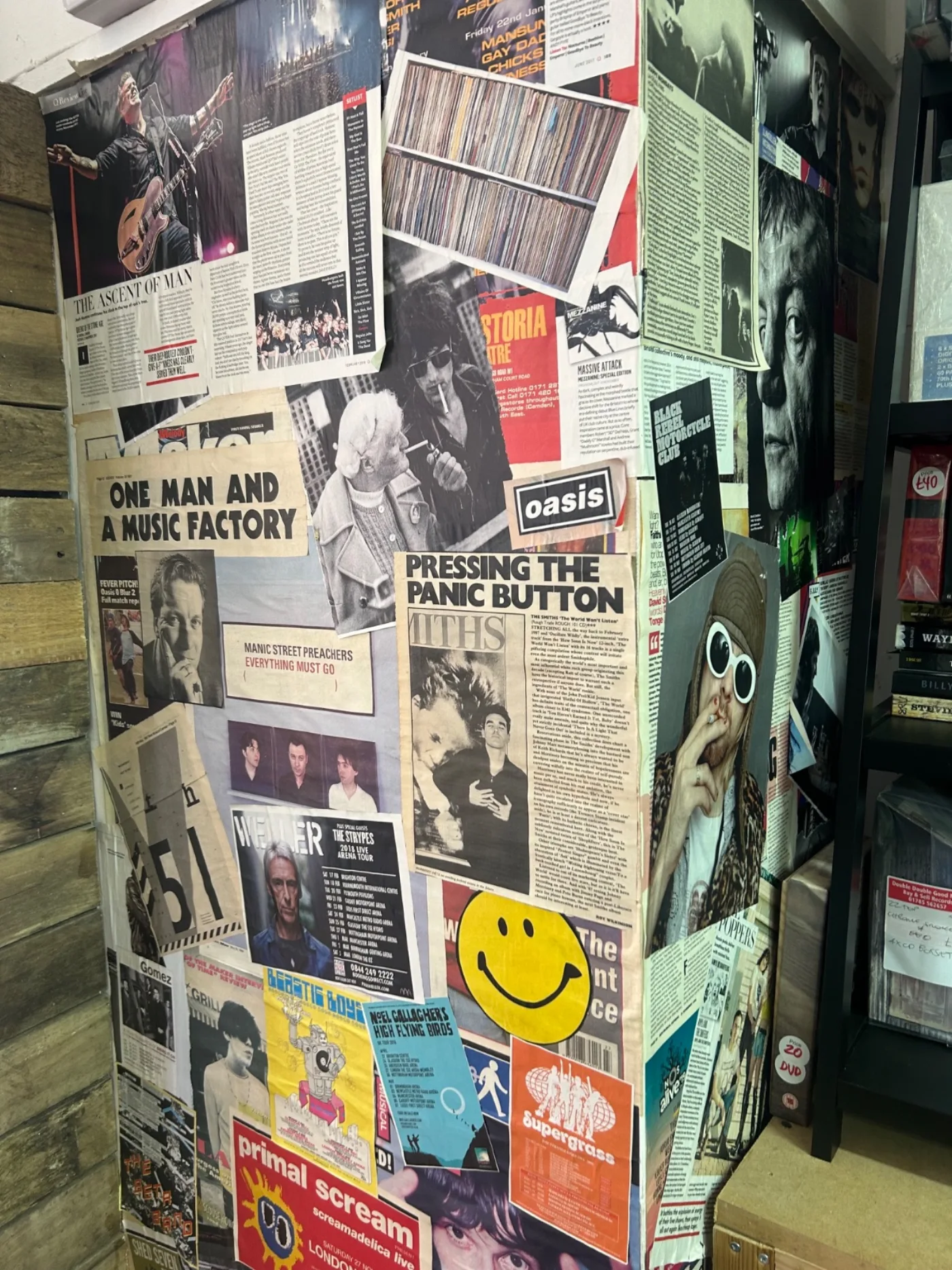 Music press collage wall inside Double Double Good
