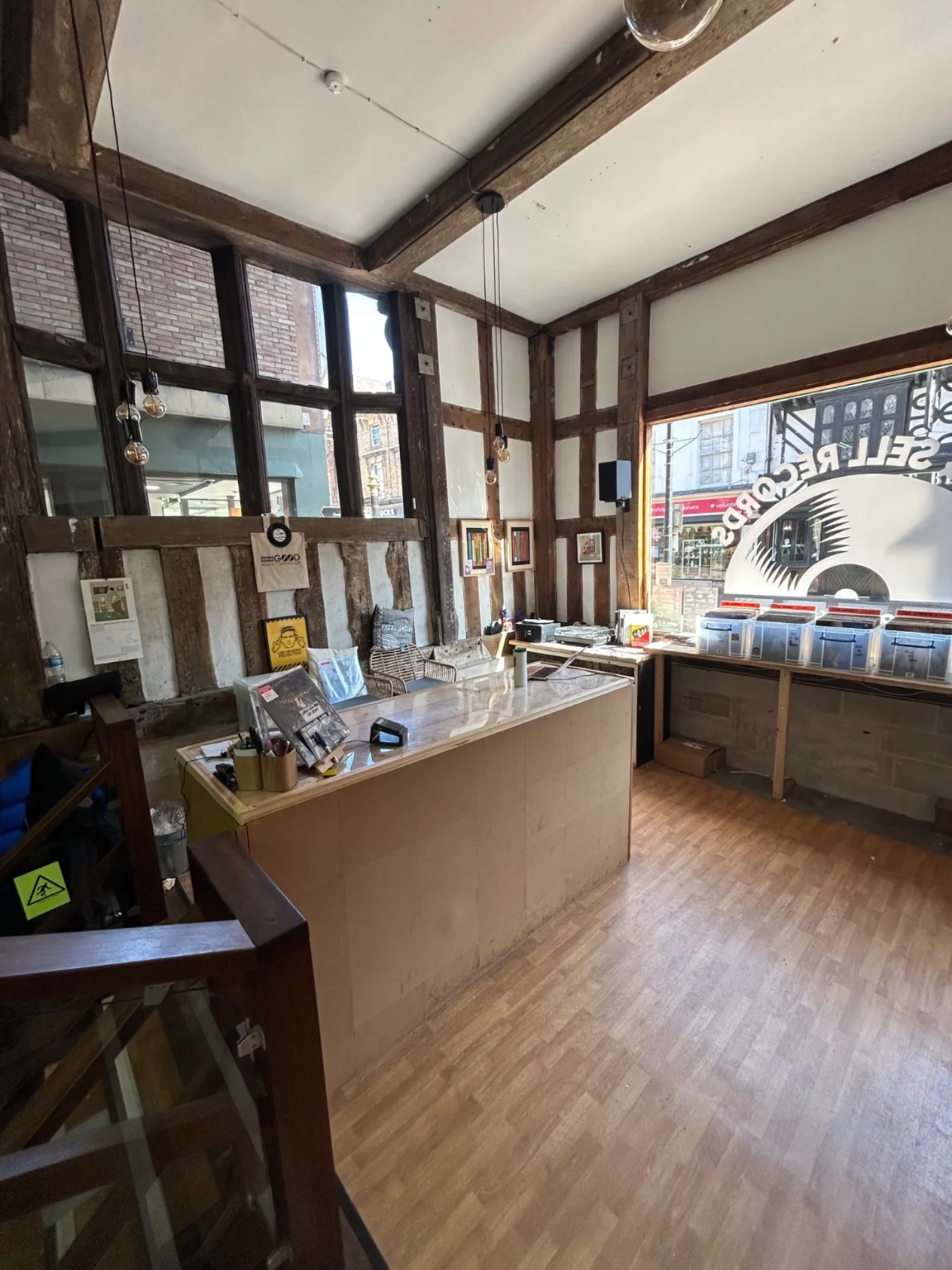 Shop counter and front window inside the timber-framed building